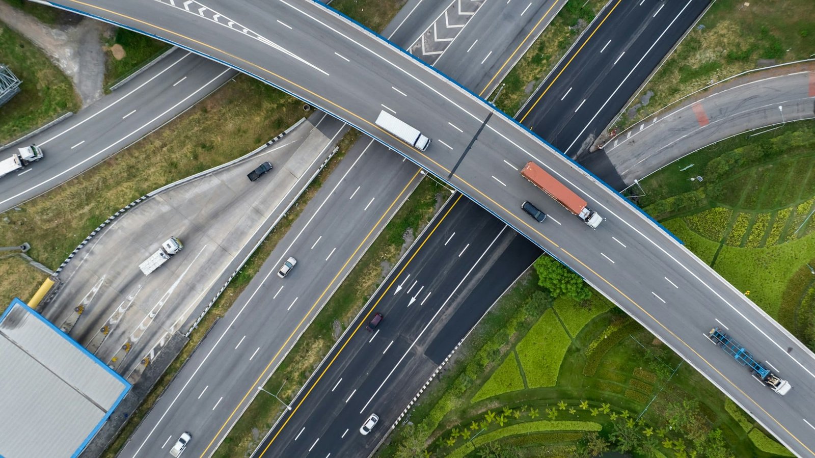 Aerial top view of highway junction interchange road. Drone view of the elevated road, traffic